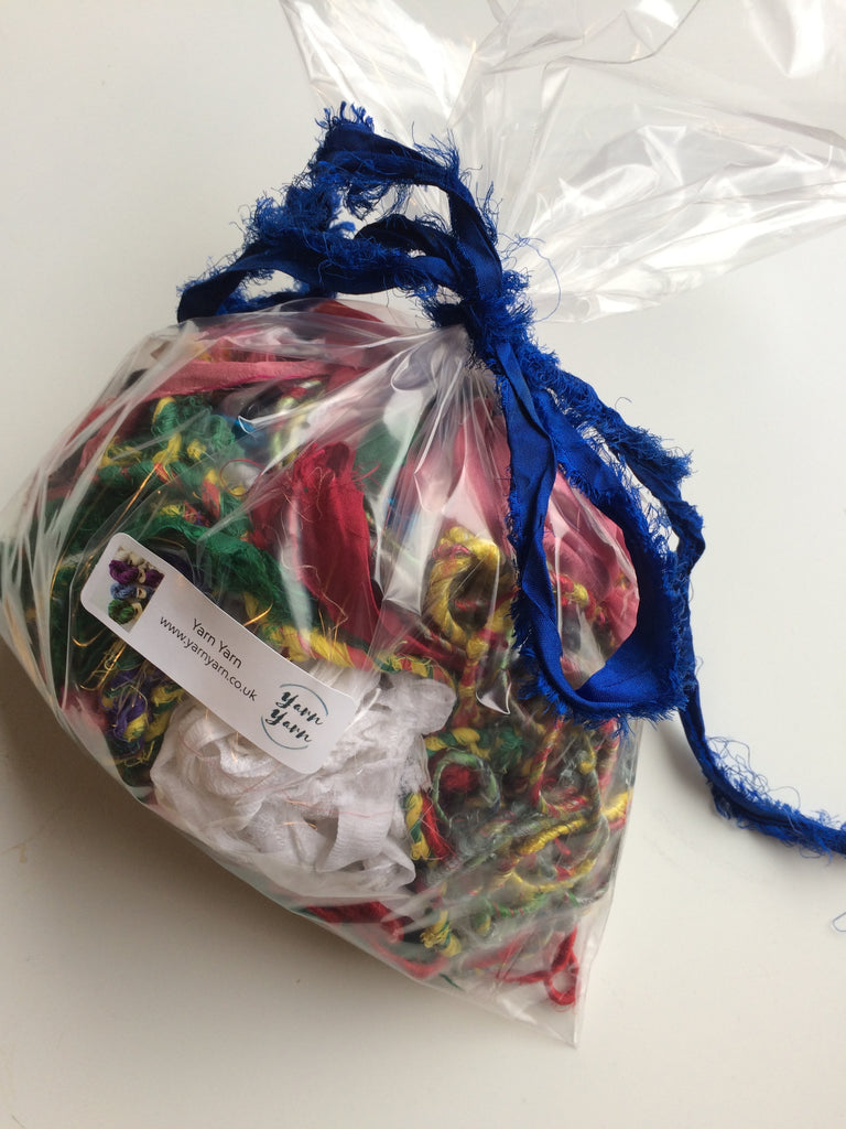 Big bags of colourful yarns, sari silk ribbon and more.