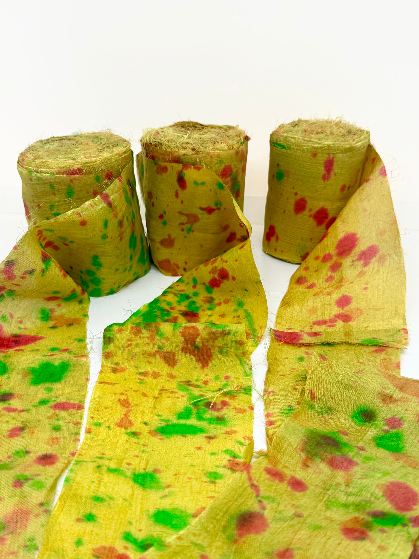 Sari silk fabric rolls hand spray dyed. Moss lit green