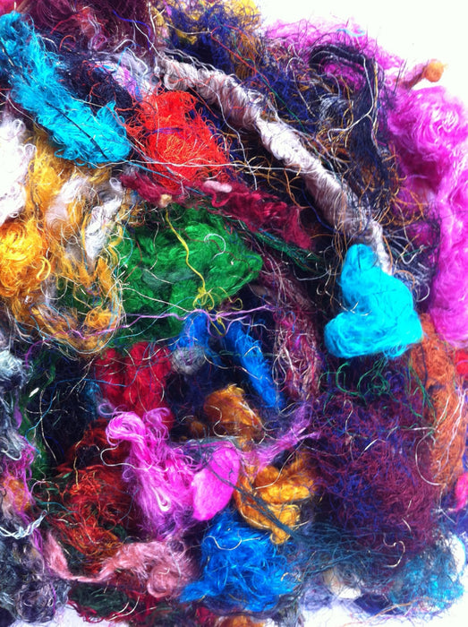 Silk waste fibres from sari making. Spin your own yarn, roving, felting.
