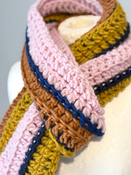 Crochet Norwegian wool scarf in long vertical lines.