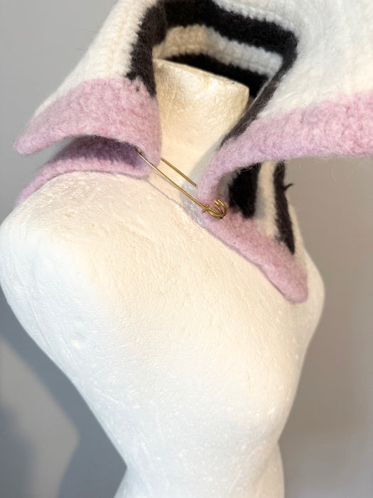 Crochet then felted Norwegian wool snood with vintage kilt pin fastening.