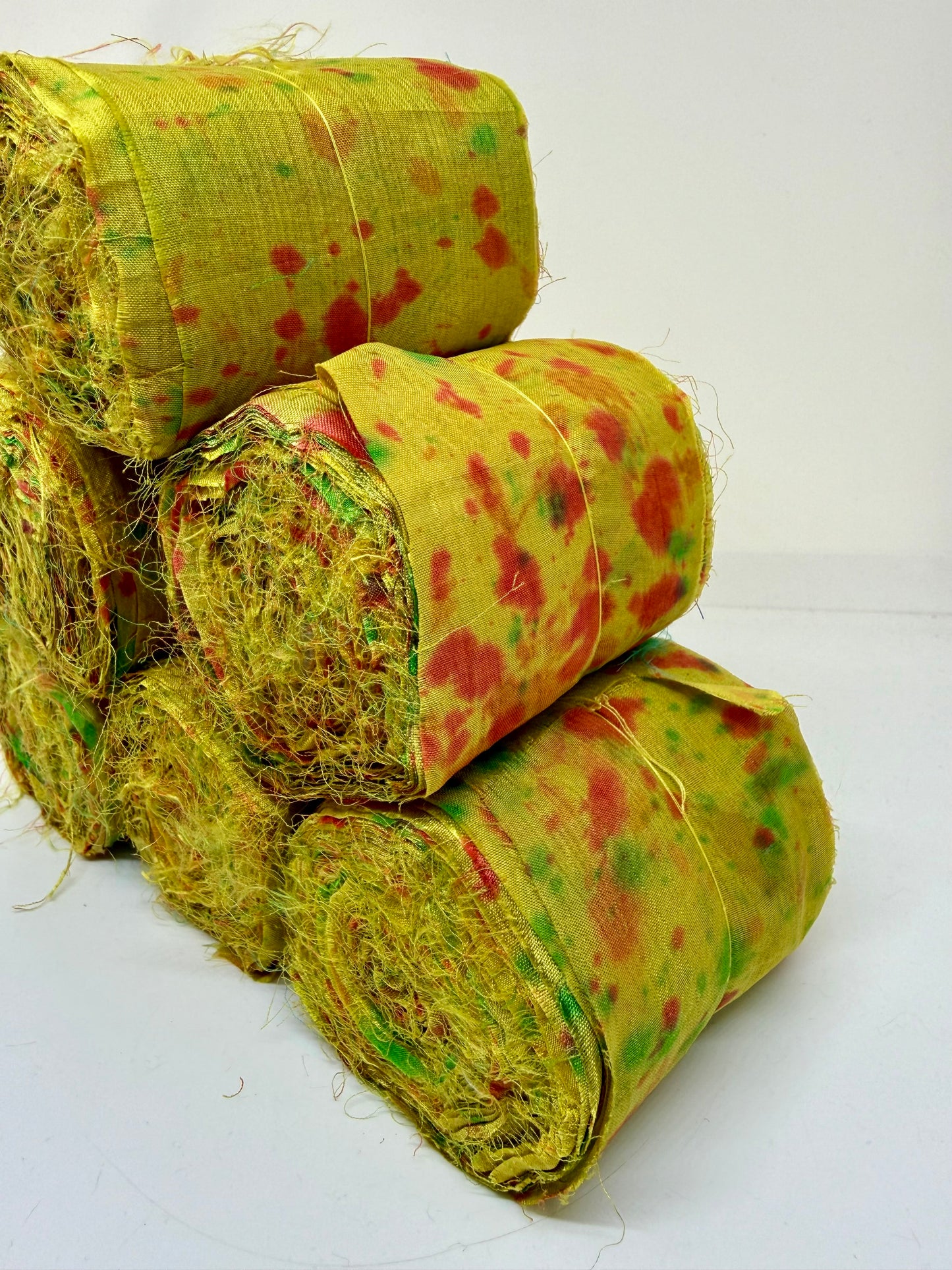 Sari silk fabric rolls hand spray dyed. Moss lit green