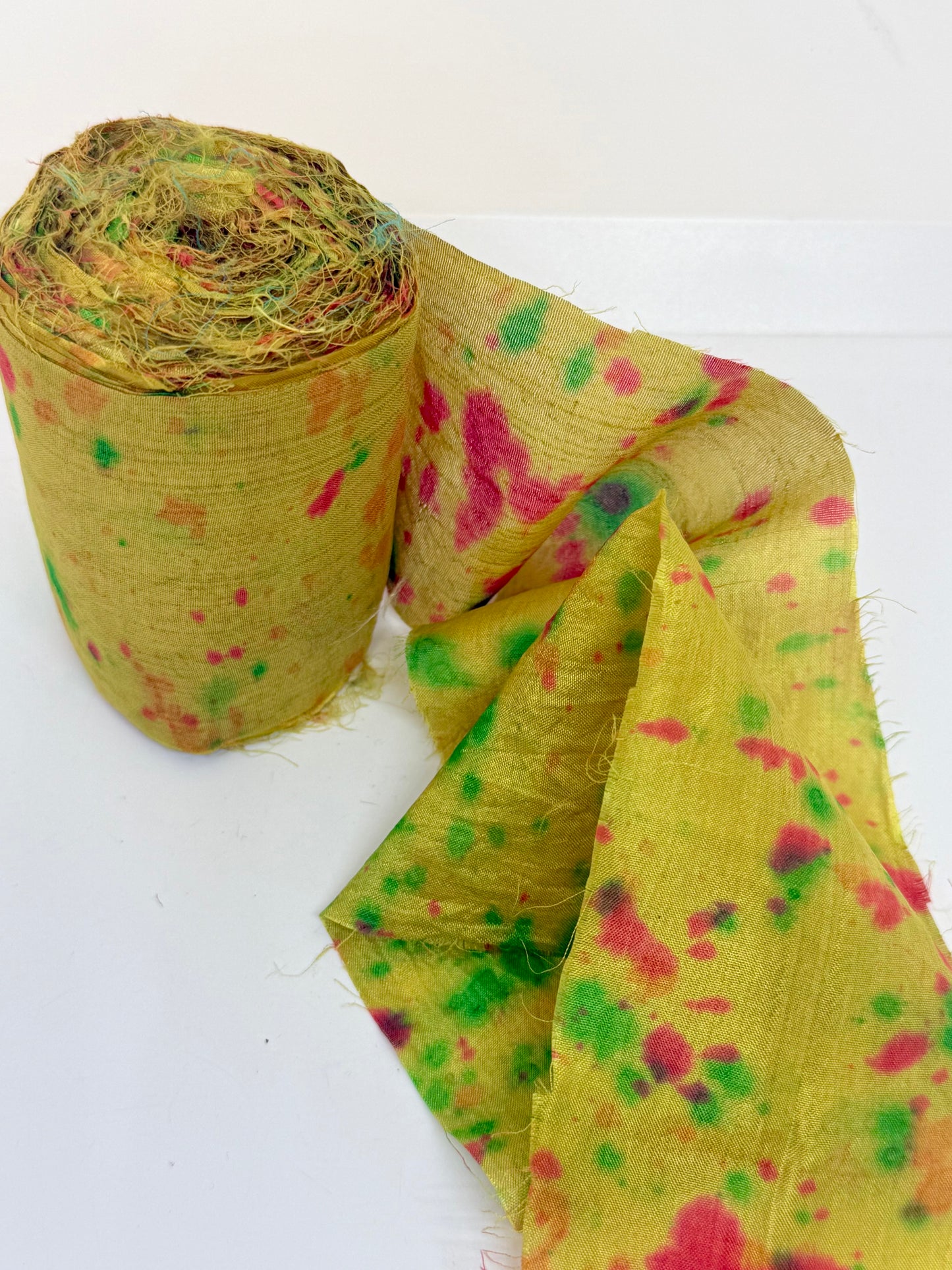 Sari silk fabric rolls hand spray dyed. Moss lit green