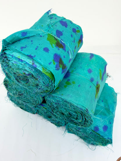 Sari silk fabric rolls hand spray dyed. Blue Reef