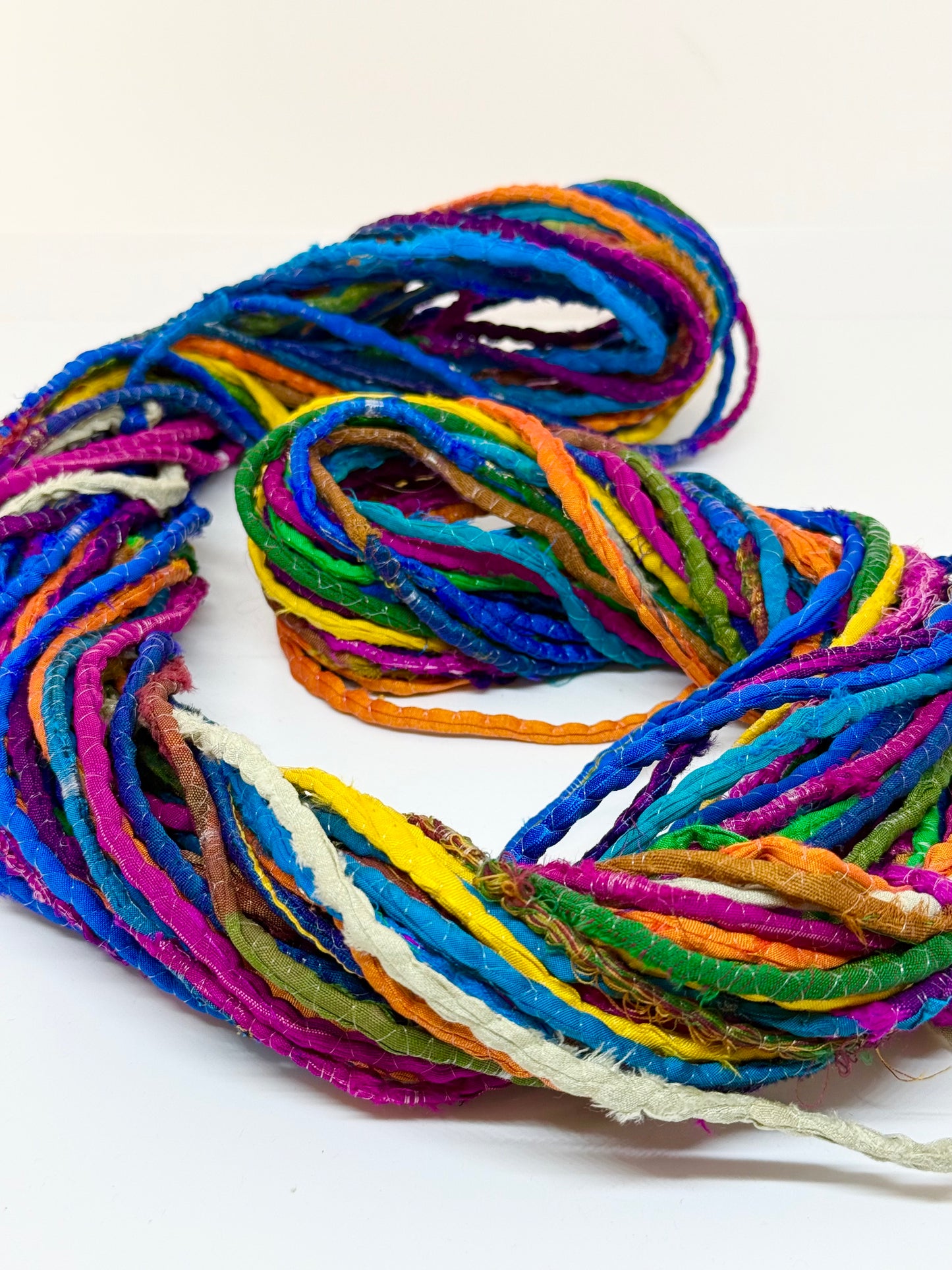 Sari silk ribbon cord, hand-twisted, hammed sari fabric yarn. SOLD OUT