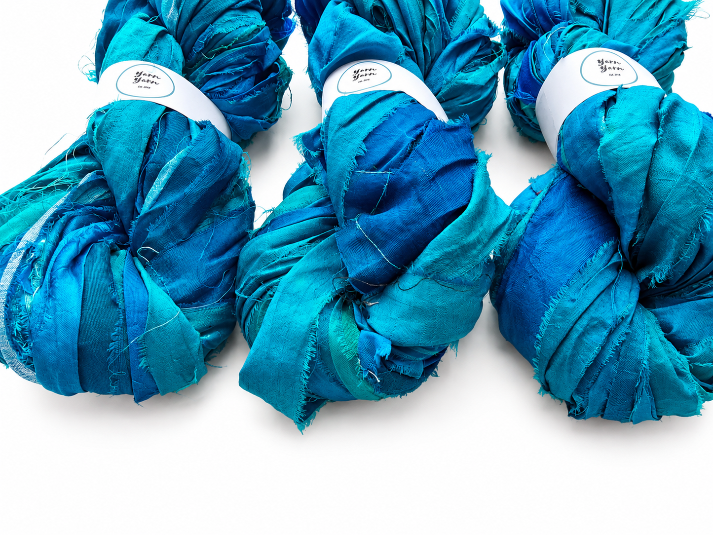 Sari Silk Ribbon Yarn in Turquoise Blue. Weaving and Fibre Art Yarn.