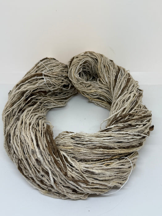 Organic eri and wild tassar raw silk yarn.