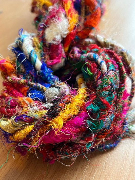 Twisted sari silk yarn, huge texture, mixed fibres, made from sari waste, chunky yarn.