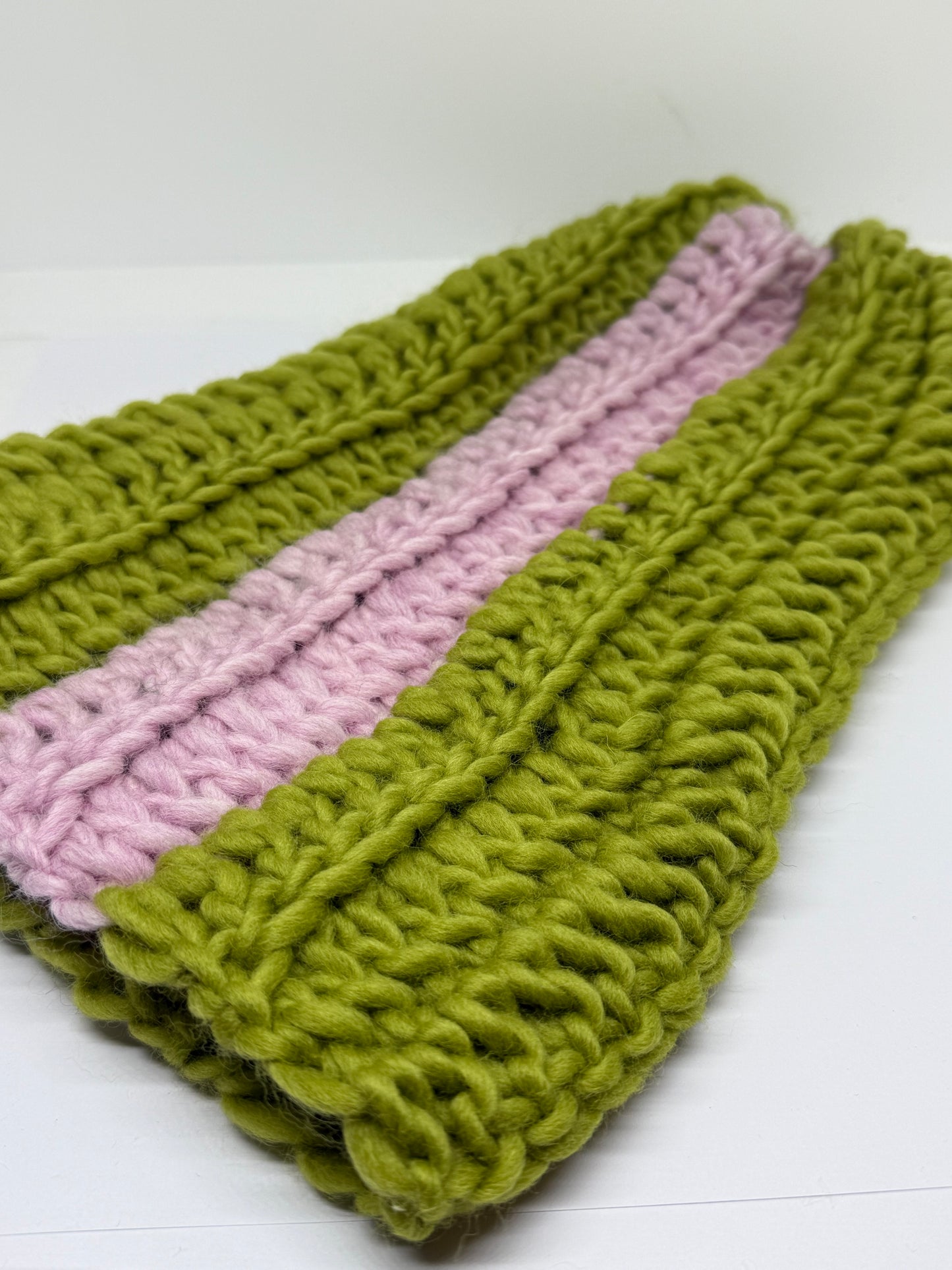 Crochet beanie in pine green and rose pink Norwegian wool.