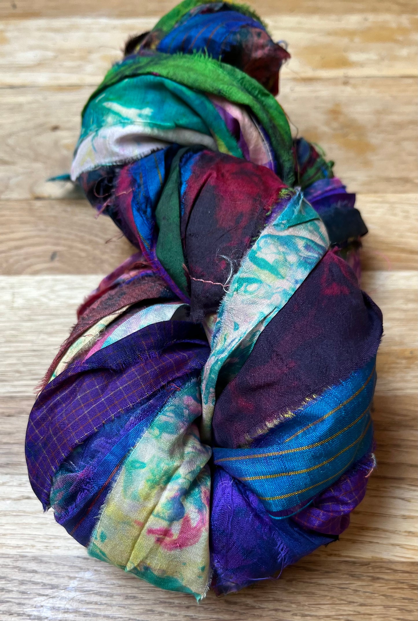 Sari silk ribbon expertly tie dyed by artisans in india.