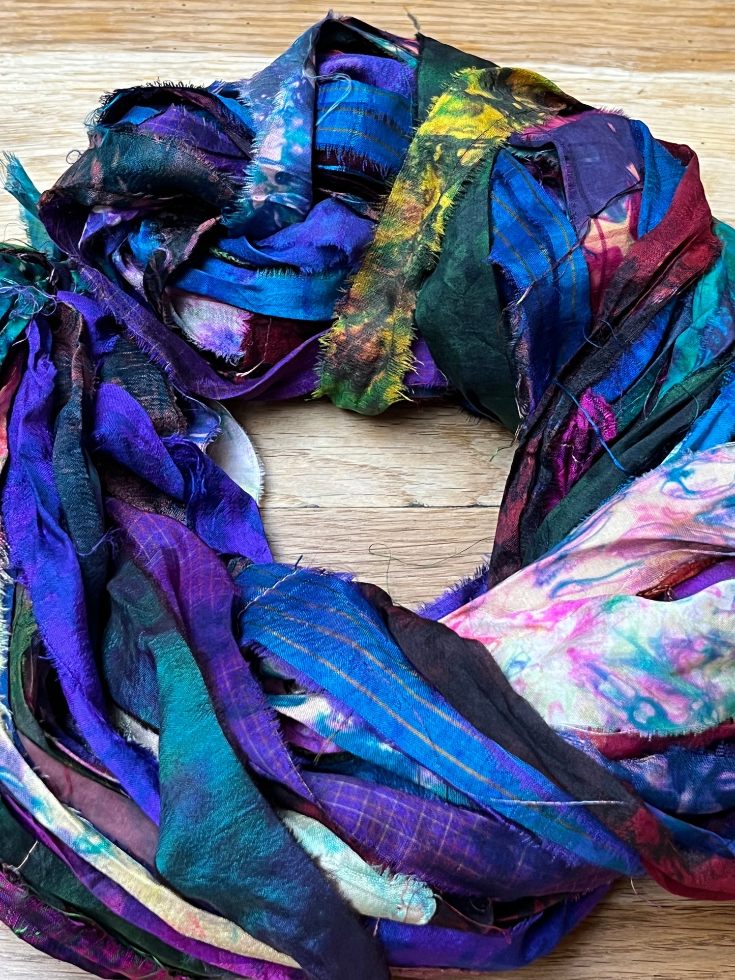 Sari silk ribbon expertly tie dyed by artisans in india.