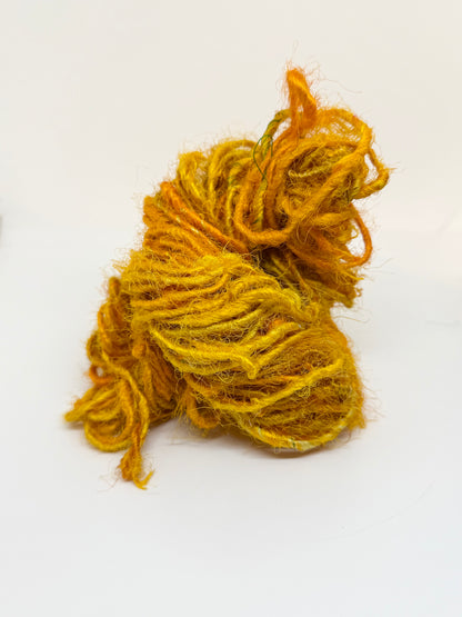 Sari silk yarn, recycled silk fibres from sari mills. Weaving, crochet and knitting crafts.