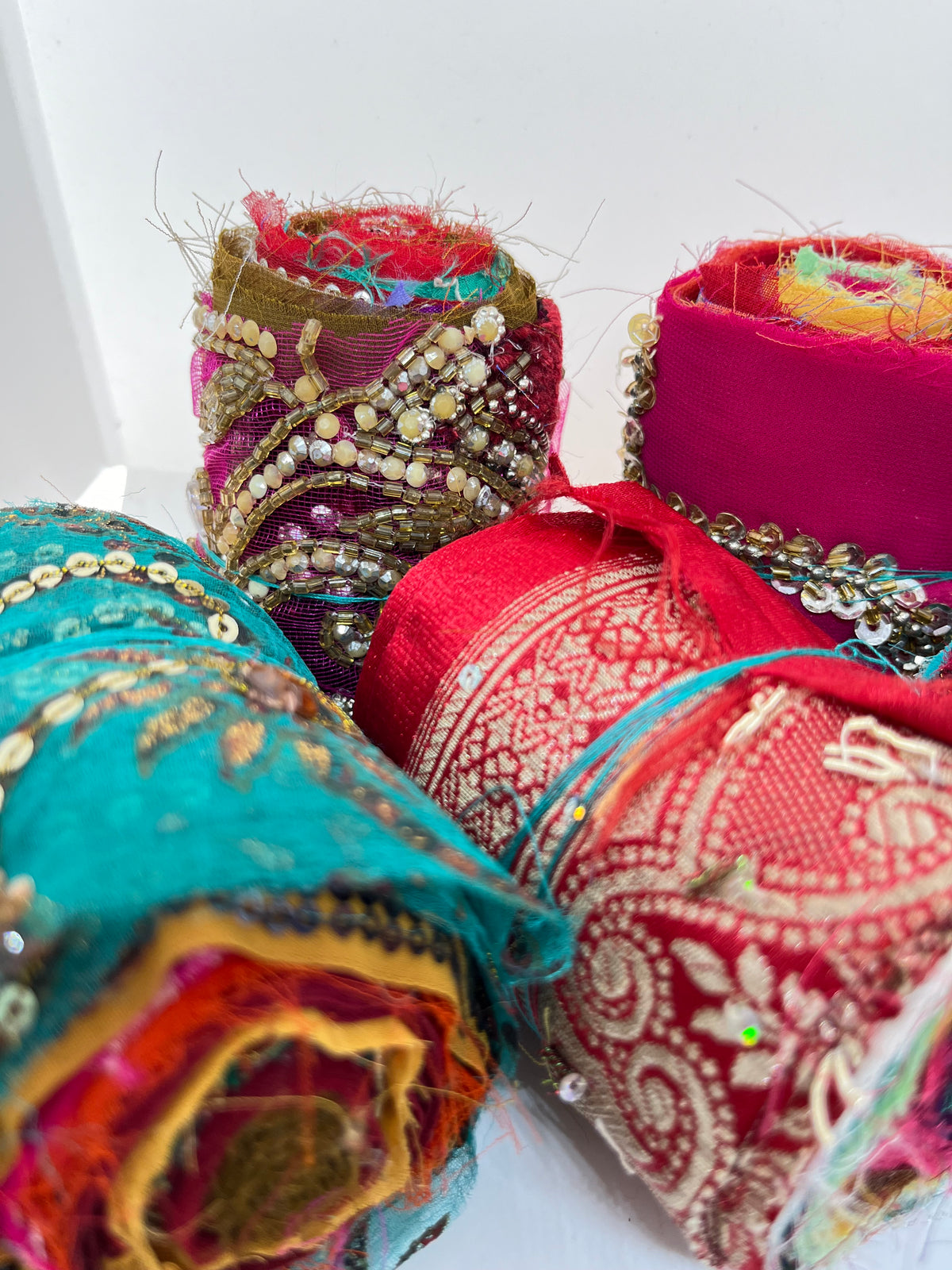 Embroidered, embellished silk rolls. – Yarn Yarn