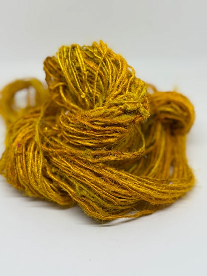 Sari silk yarn, golden yellow, waste silk handspun.