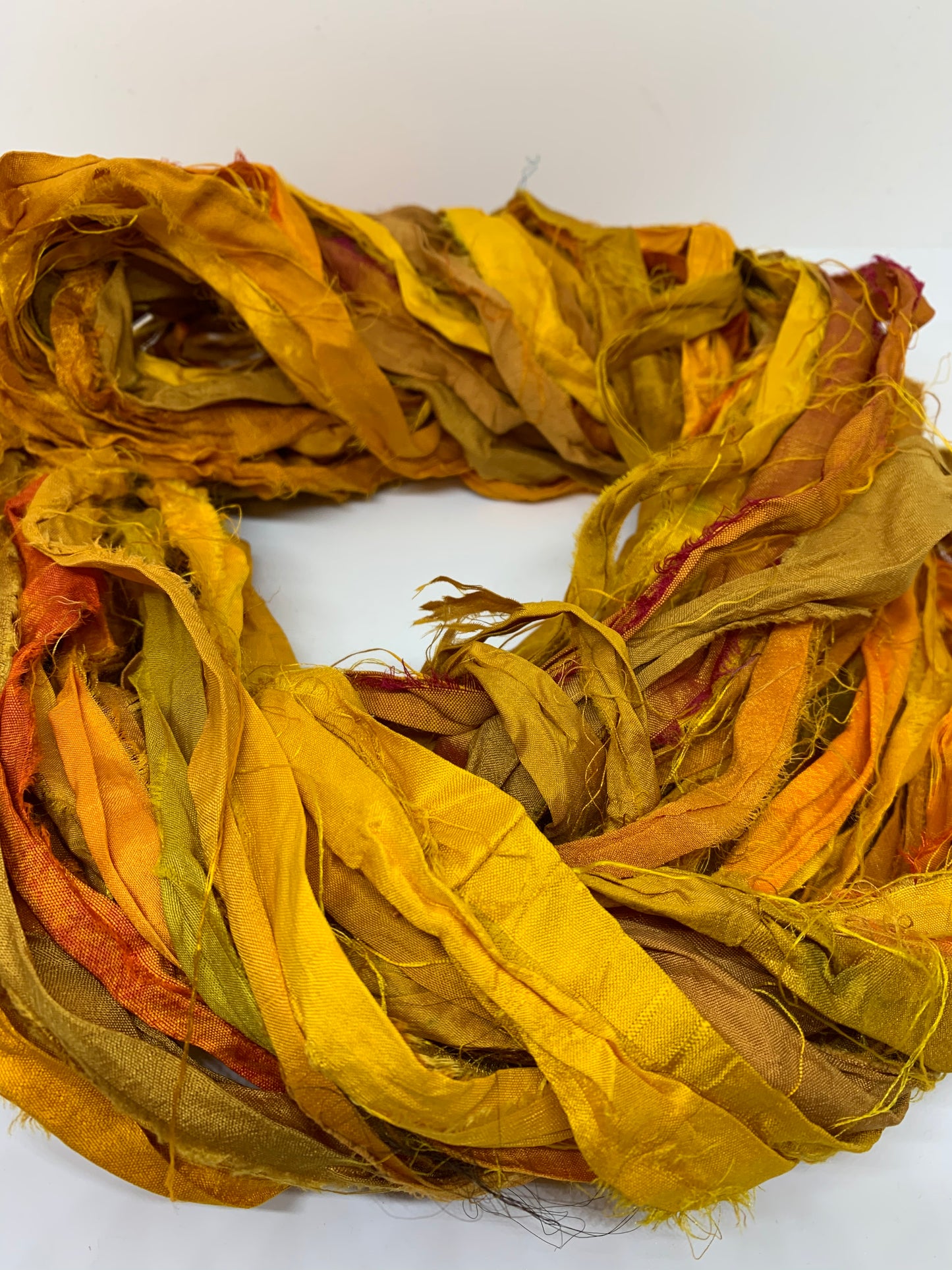 Sari silk ribbon yarn, wide strips, gold.
