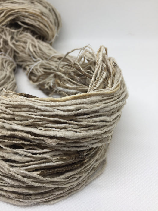 Organic eri and wild tassar raw silk yarn.